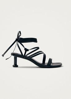 Curly Black Leather Sandals via Alohas