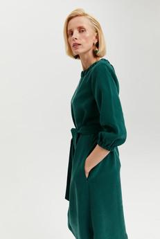 Celine | Elegant Belted Dress with Neckline Element in Forest Green via AYANI