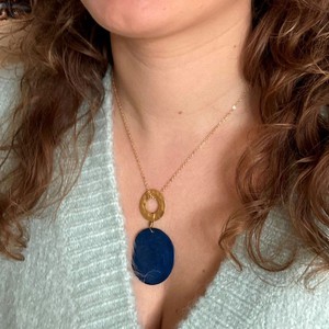 Celeste ketting met hanger van tagua en een goudkleurige ring - rood from MoreThanHip