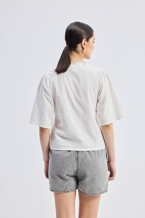 Relaxed Fit Top With Ruffles and Front-Ties in White from Reistor