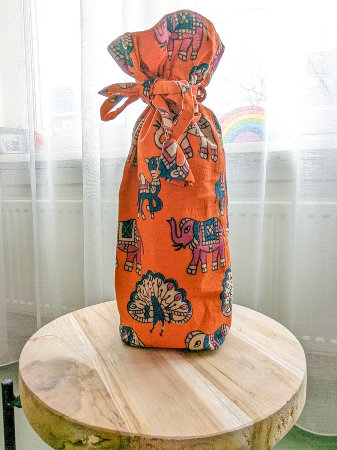 Reusable Kalamkari Cotton Pouch, Bottle Gift Bag, Orange from Shakti.ism